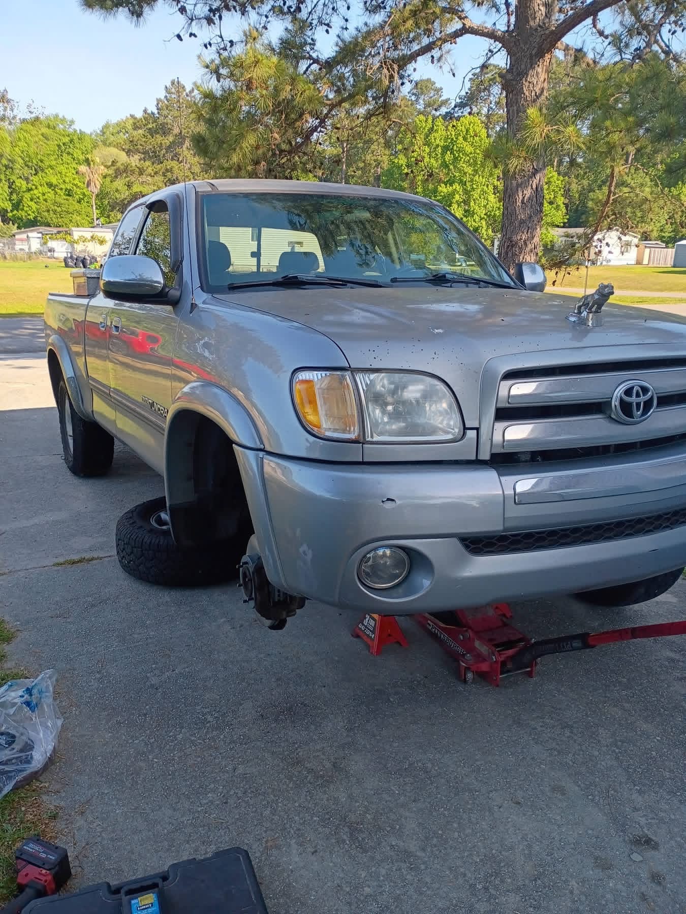 Toyota Tundra on jack stands for mobile brake service